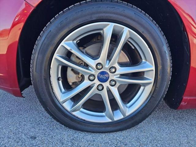 used 2016 Ford Fusion Hybrid car, priced at $9,999
