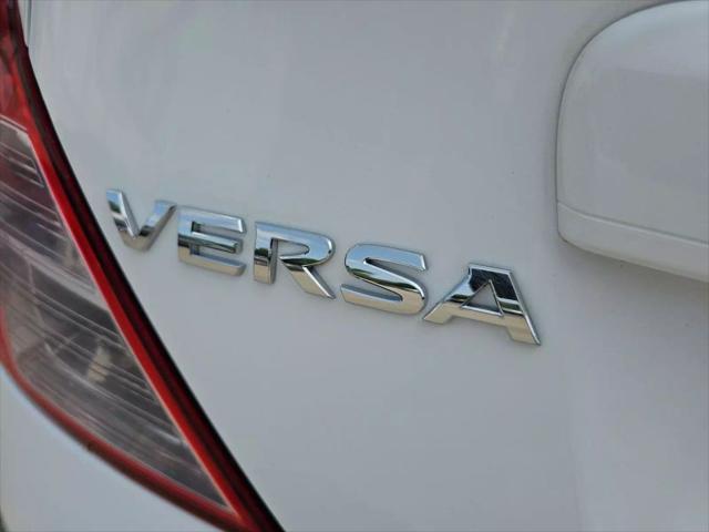 used 2012 Nissan Versa car, priced at $5,999
