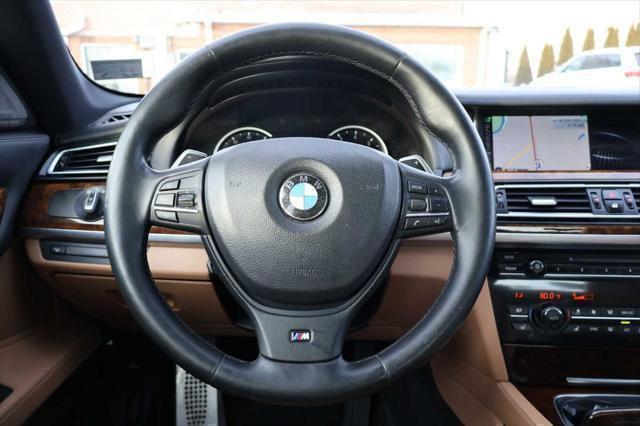 used 2015 BMW 750 car, priced at $15,995