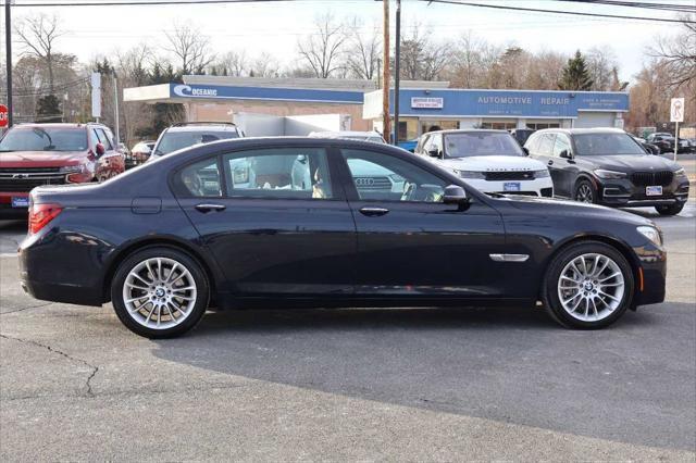 used 2015 BMW 750 car, priced at $15,995