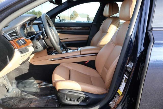 used 2015 BMW 750 car, priced at $15,995