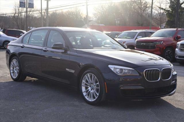 used 2015 BMW 750 car, priced at $15,995