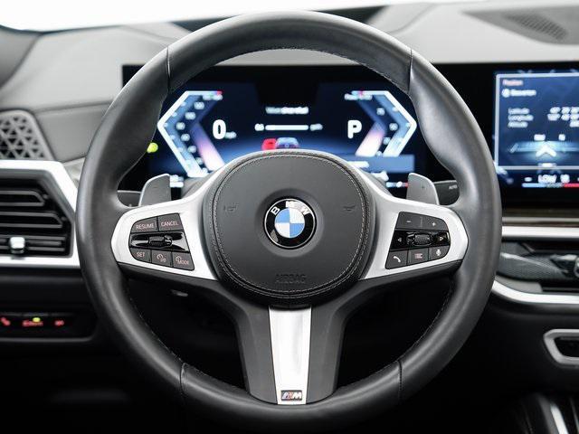 used 2025 BMW X6 car, priced at $61,250