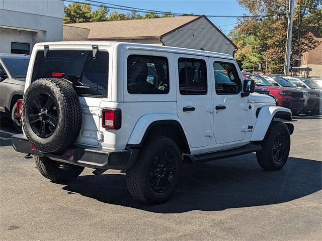 used 2021 Jeep Wrangler Unlimited car, priced at $34,606