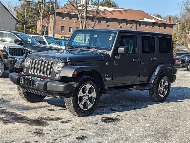 used 2017 Jeep Wrangler Unlimited car, priced at $24,794