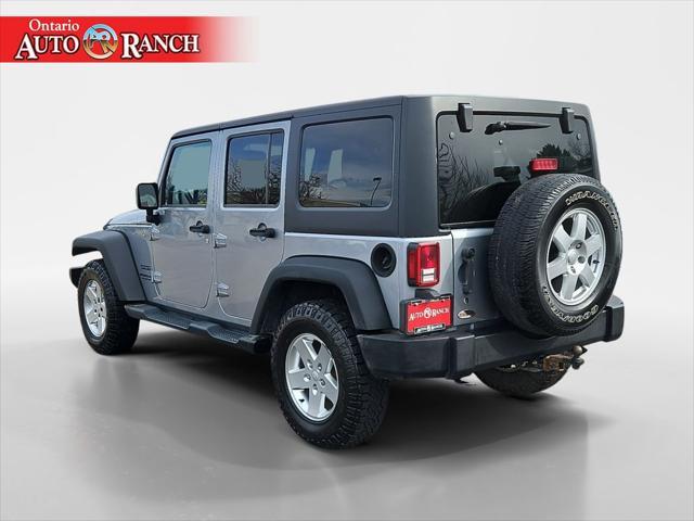 used 2014 Jeep Wrangler Unlimited car, priced at $15,161