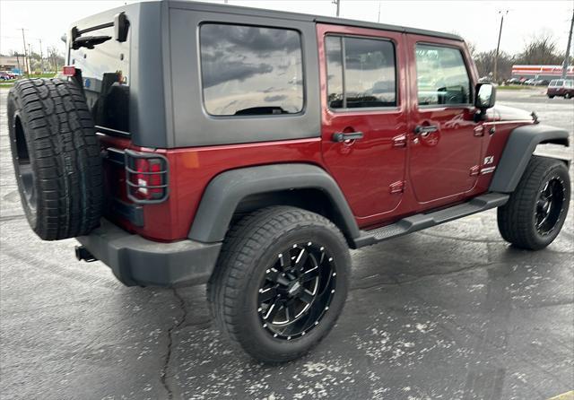 used 2009 Jeep Wrangler Unlimited car, priced at $17,995