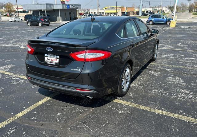 used 2015 Ford Fusion Hybrid car, priced at $14,995