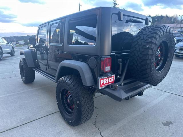 used 2015 Jeep Wrangler Unlimited car, priced at $26,998