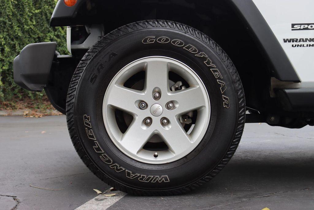 used 2016 Jeep Wrangler Unlimited car, priced at $19,521