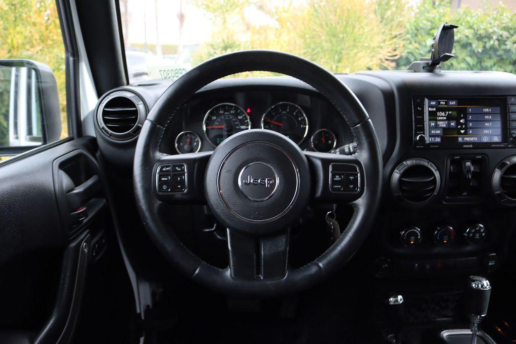 used 2016 Jeep Wrangler Unlimited car, priced at $19,521