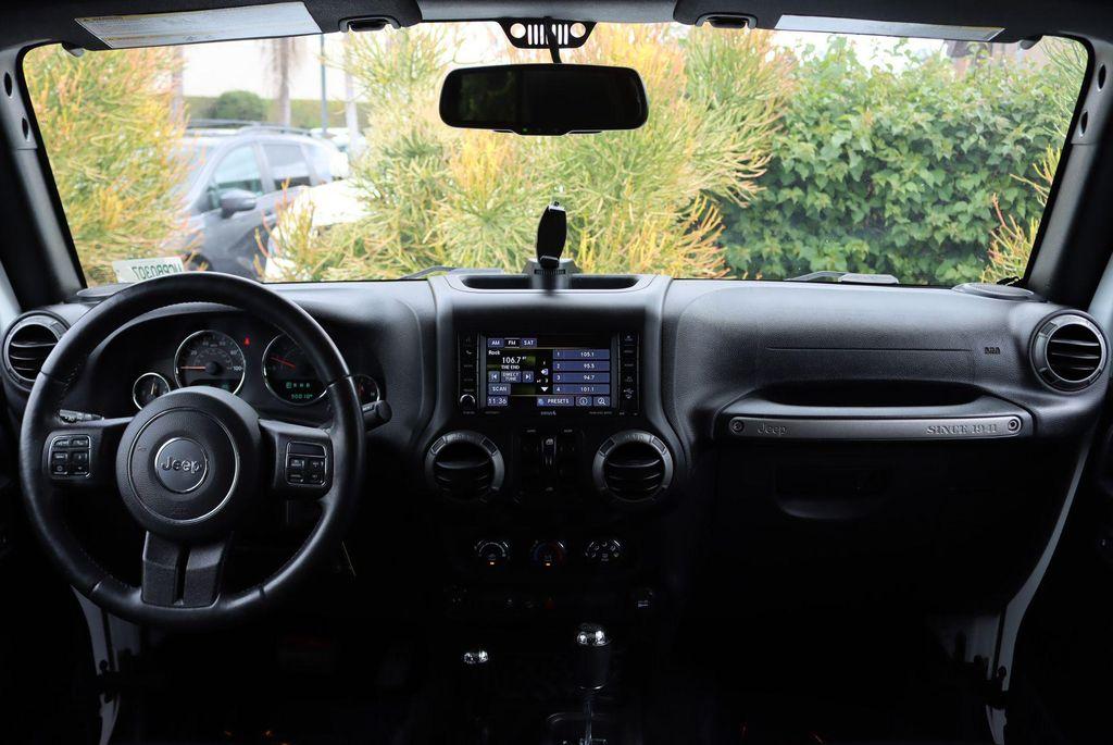 used 2016 Jeep Wrangler Unlimited car, priced at $19,521