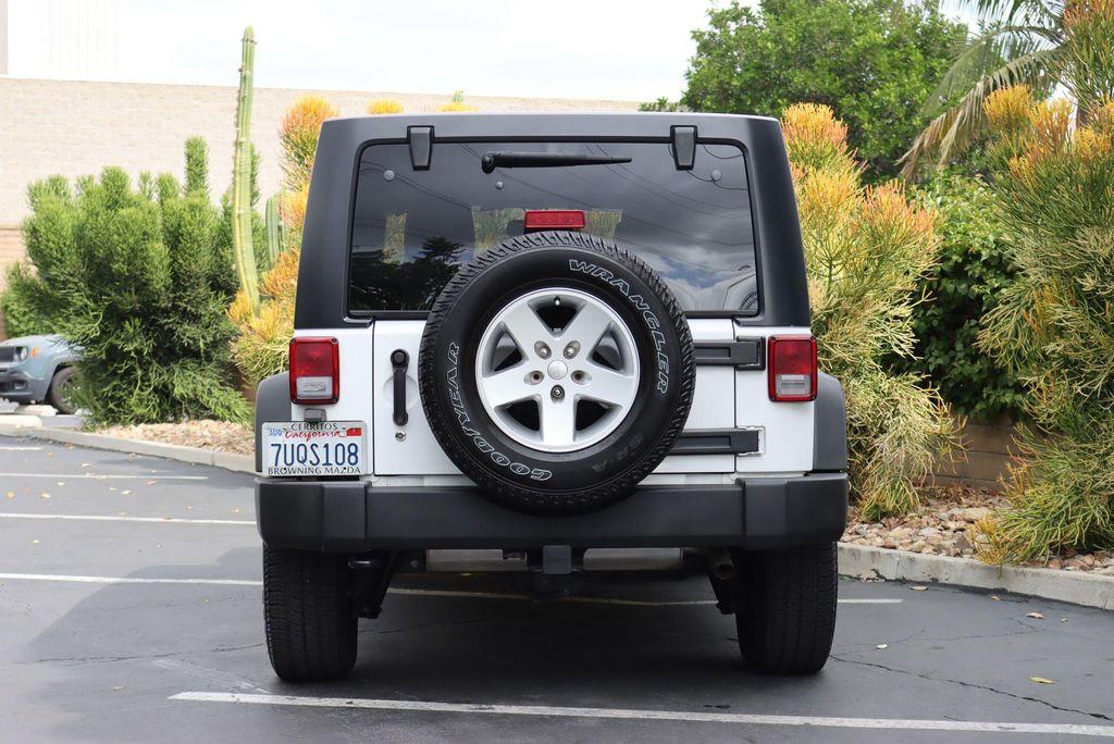 used 2016 Jeep Wrangler Unlimited car, priced at $19,521