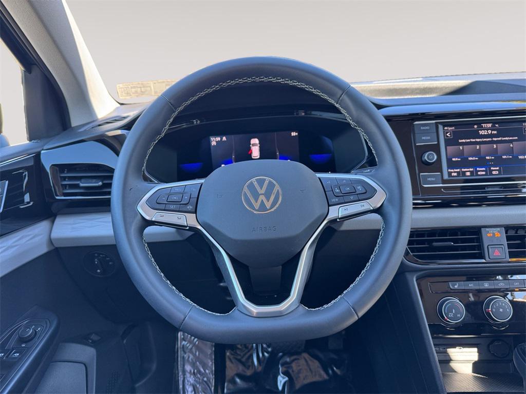 used 2023 Volkswagen Taos car, priced at $22,491