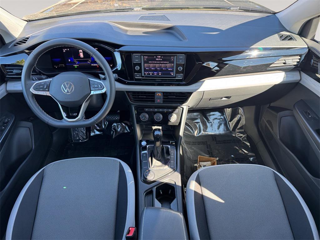 used 2023 Volkswagen Taos car, priced at $22,491