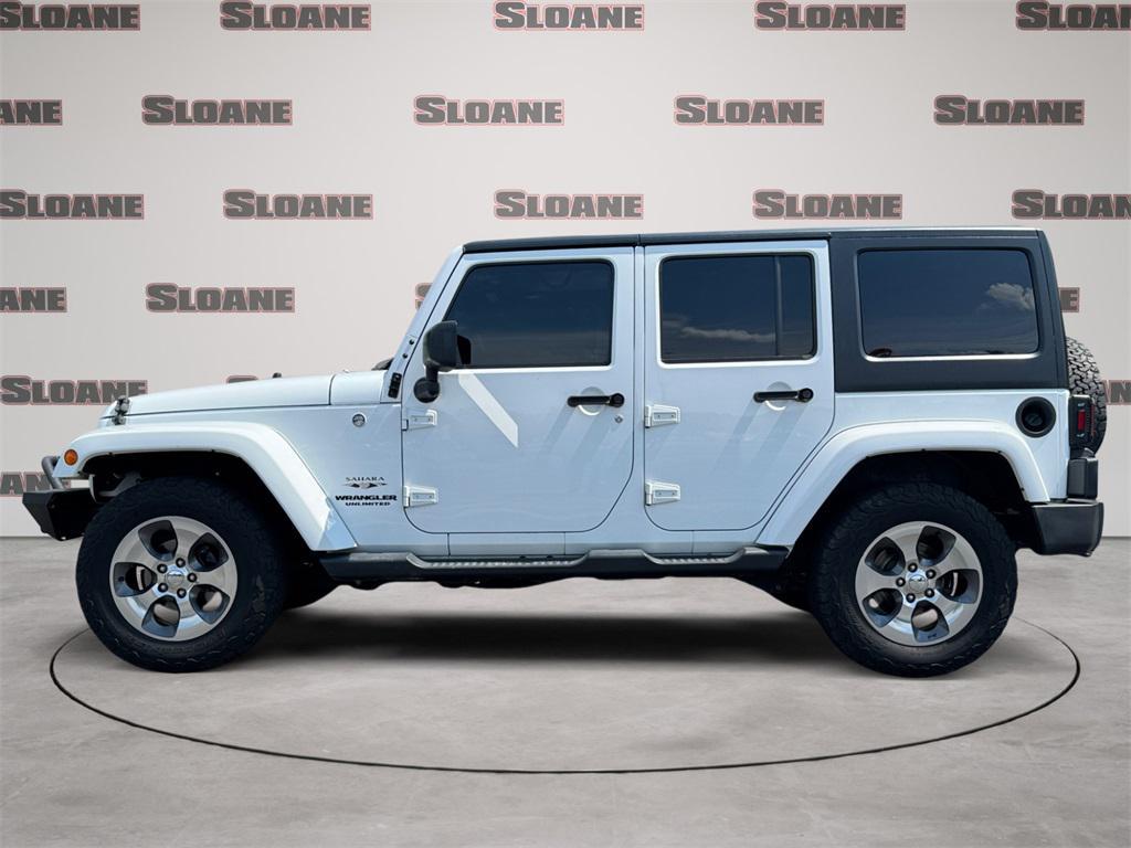 used 2017 Jeep Wrangler Unlimited car, priced at $18,934