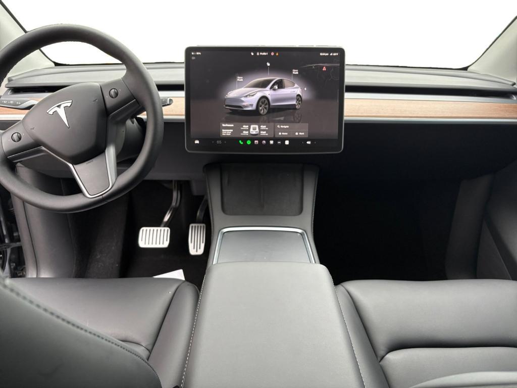 used 2025 Tesla Model Y car, priced at $38,990
