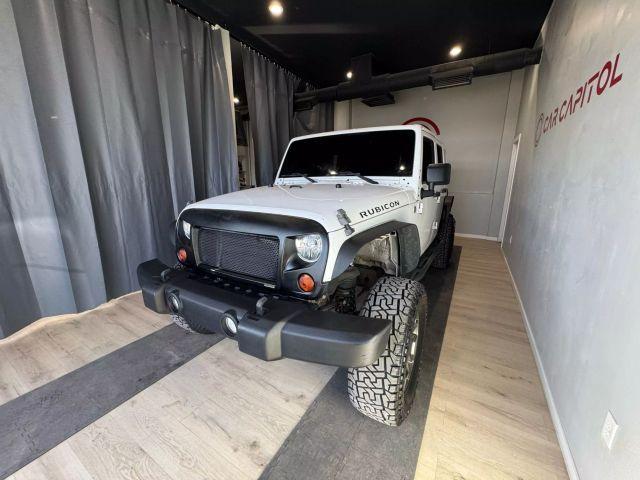 used 2013 Jeep Wrangler Unlimited car, priced at $18,995
