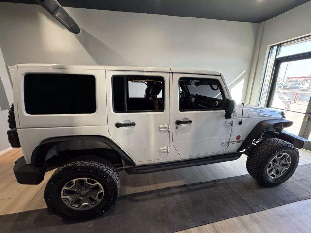 used 2013 Jeep Wrangler Unlimited car, priced at $18,995