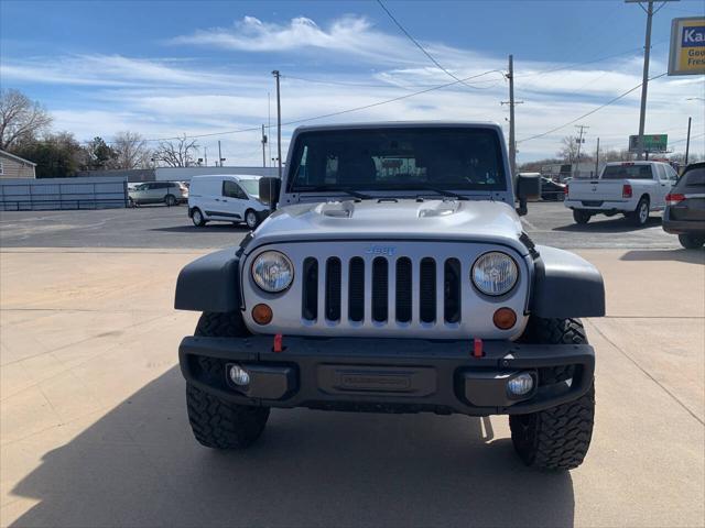 used 2013 Jeep Wrangler Unlimited car, priced at $17,999