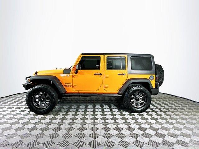 used 2013 Jeep Wrangler Unlimited car, priced at $12,500