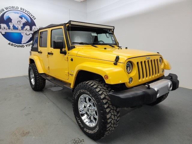 used 2015 Jeep Wrangler Unlimited car, priced at $19,490