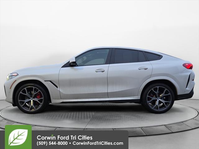 used 2022 BMW X6 car, priced at $52,598