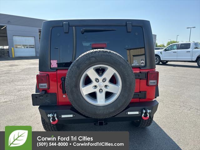 used 2015 Jeep Wrangler Unlimited car, priced at $19,139