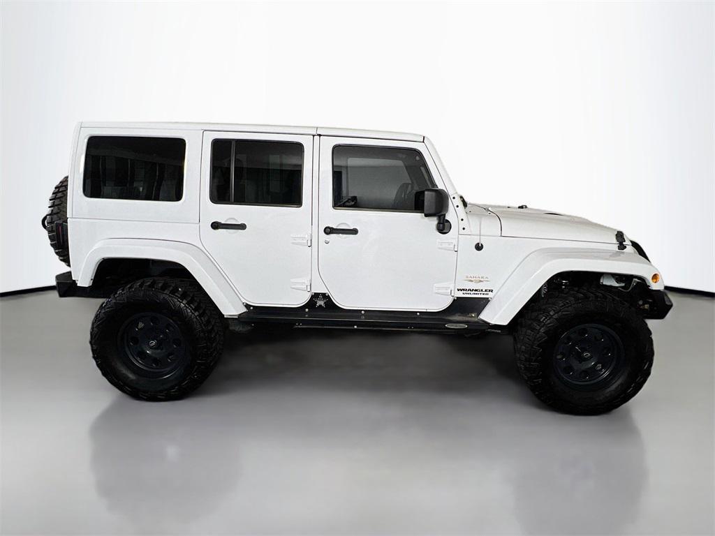 used 2012 Jeep Wrangler Unlimited car, priced at $14,999