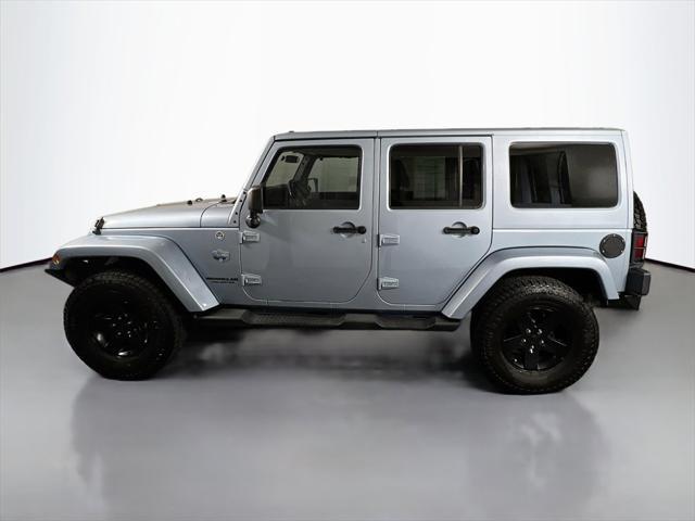used 2012 Jeep Wrangler Unlimited car, priced at $14,959