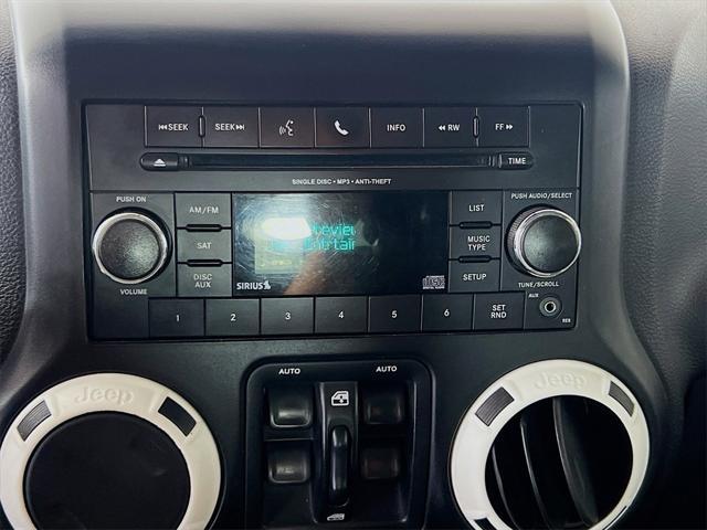 used 2012 Jeep Wrangler Unlimited car, priced at $14,959