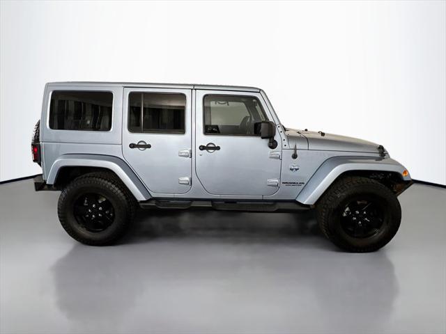 used 2012 Jeep Wrangler Unlimited car, priced at $14,959