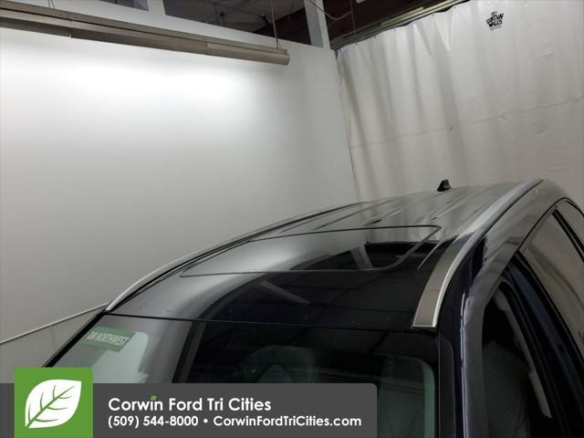 used 2021 Toyota Highlander Hybrid car, priced at $32,500