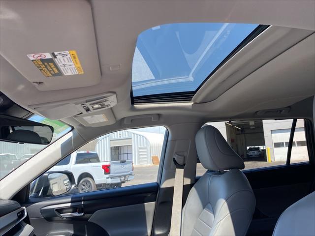 used 2021 Toyota Highlander Hybrid car, priced at $32,500