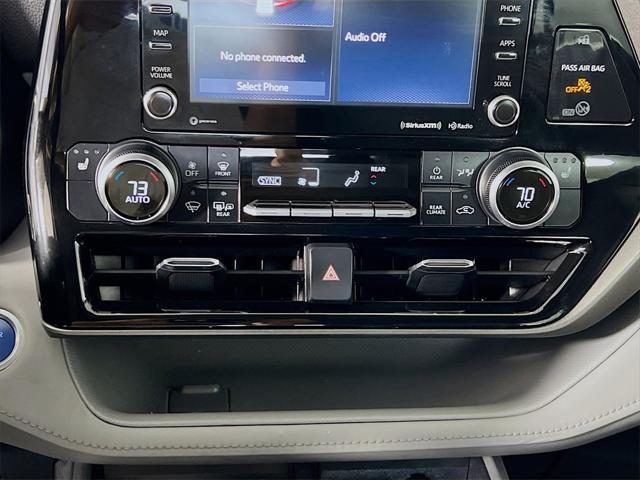 used 2021 Toyota Highlander Hybrid car, priced at $29,999