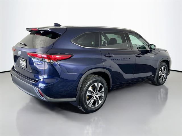 used 2021 Toyota Highlander Hybrid car, priced at $29,999