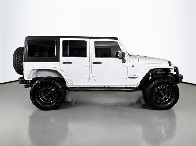 used 2014 Jeep Wrangler Unlimited car, priced at $19,999