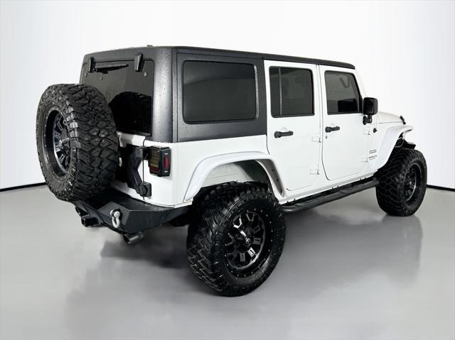 used 2014 Jeep Wrangler Unlimited car, priced at $19,999