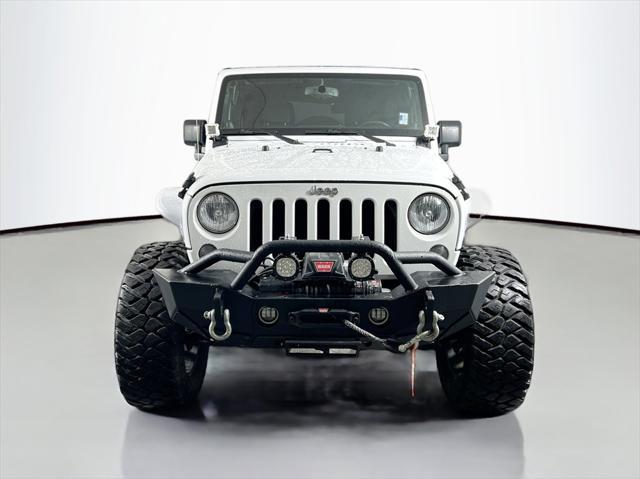 used 2014 Jeep Wrangler Unlimited car, priced at $19,999