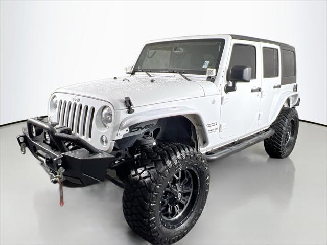 used 2014 Jeep Wrangler Unlimited car, priced at $19,999