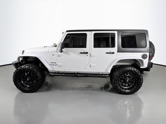 used 2014 Jeep Wrangler Unlimited car, priced at $19,999