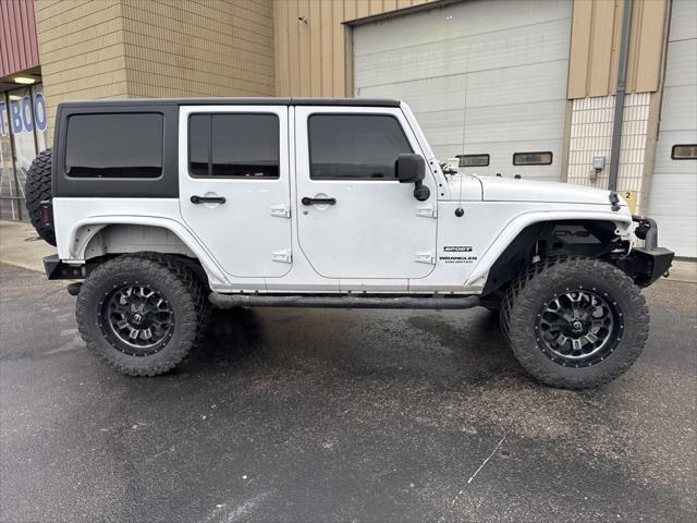 used 2014 Jeep Wrangler Unlimited car, priced at $19,999