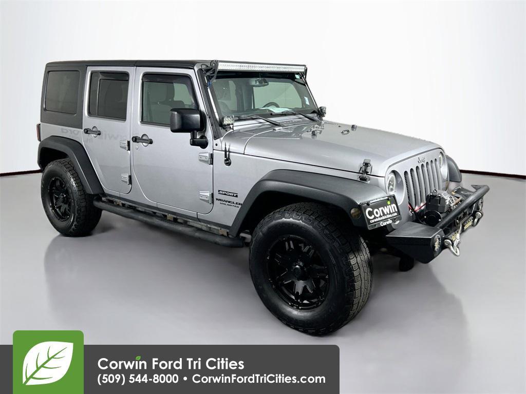 used 2015 Jeep Wrangler Unlimited car, priced at $18,810