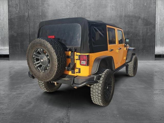 used 2013 Jeep Wrangler Unlimited car, priced at $15,799