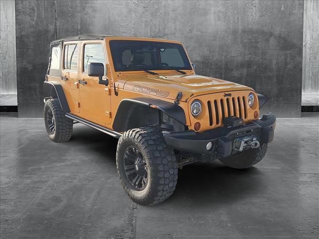 used 2013 Jeep Wrangler Unlimited car, priced at $15,799