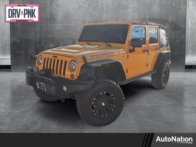 used 2013 Jeep Wrangler Unlimited car, priced at $16,499