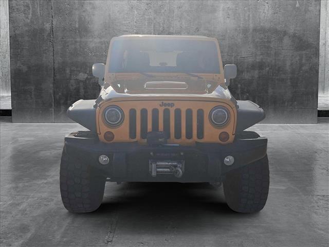 used 2013 Jeep Wrangler Unlimited car, priced at $15,799