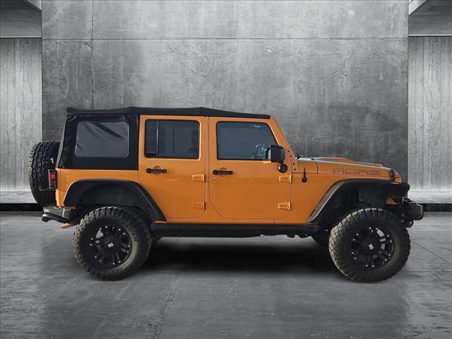 used 2013 Jeep Wrangler Unlimited car, priced at $15,799