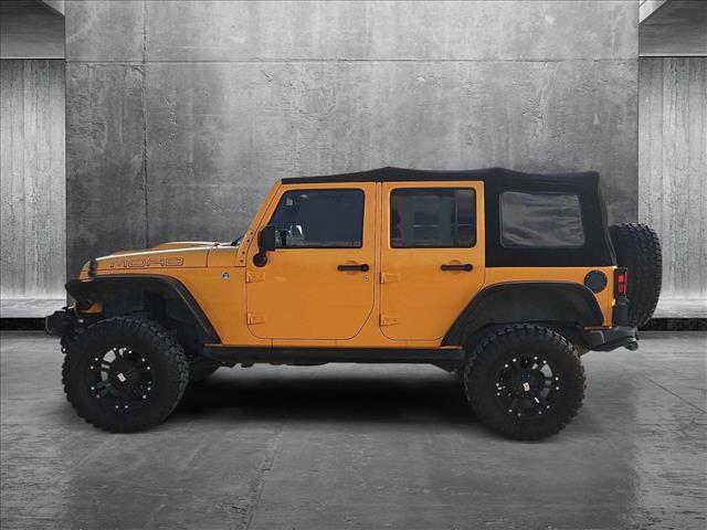 used 2013 Jeep Wrangler Unlimited car, priced at $15,799