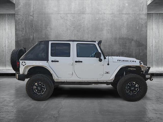 used 2012 Jeep Wrangler Unlimited car, priced at $19,499